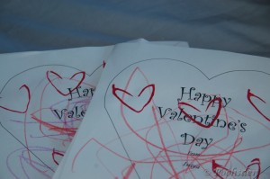 Open the envelope to find a cut-out heart with a message and some artistic strokes