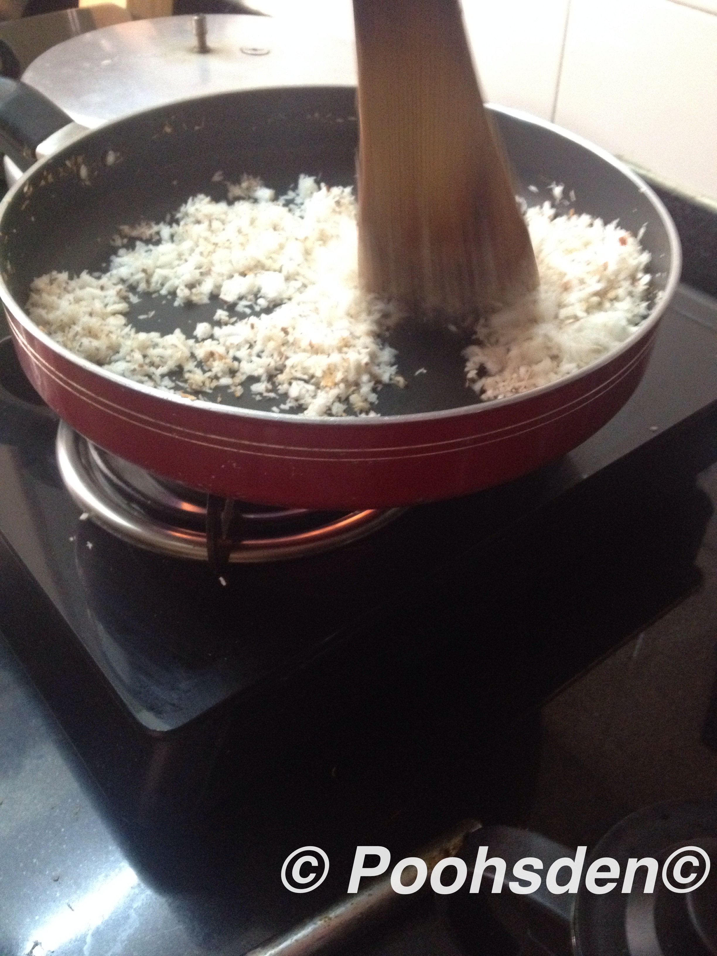 Anything fried in ghee smells diving - coconut and cardamon getting ready for the stuffing