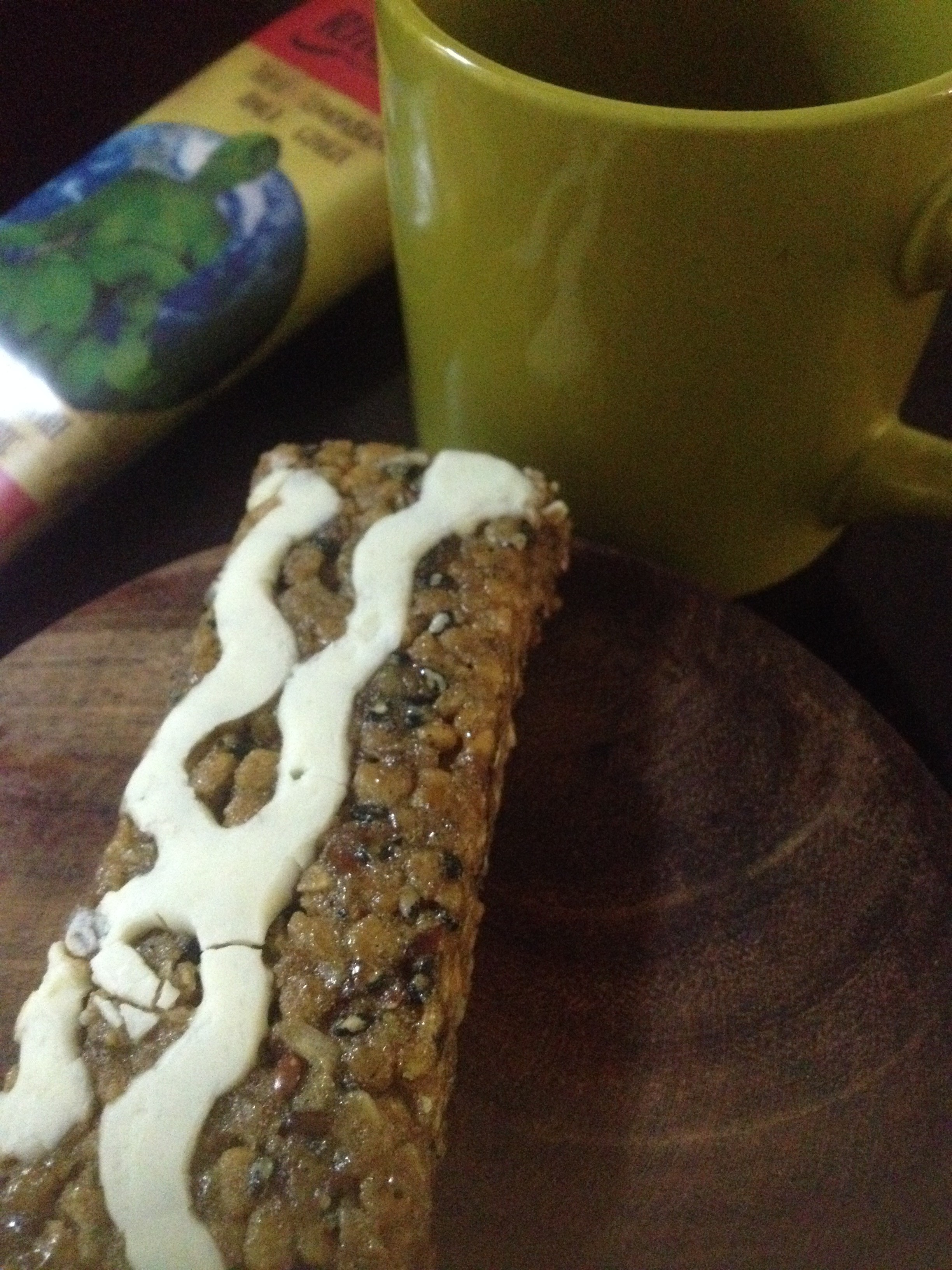 I am not sure what the white icing is but you can see the black sesame seeds and flax seeds in the bar