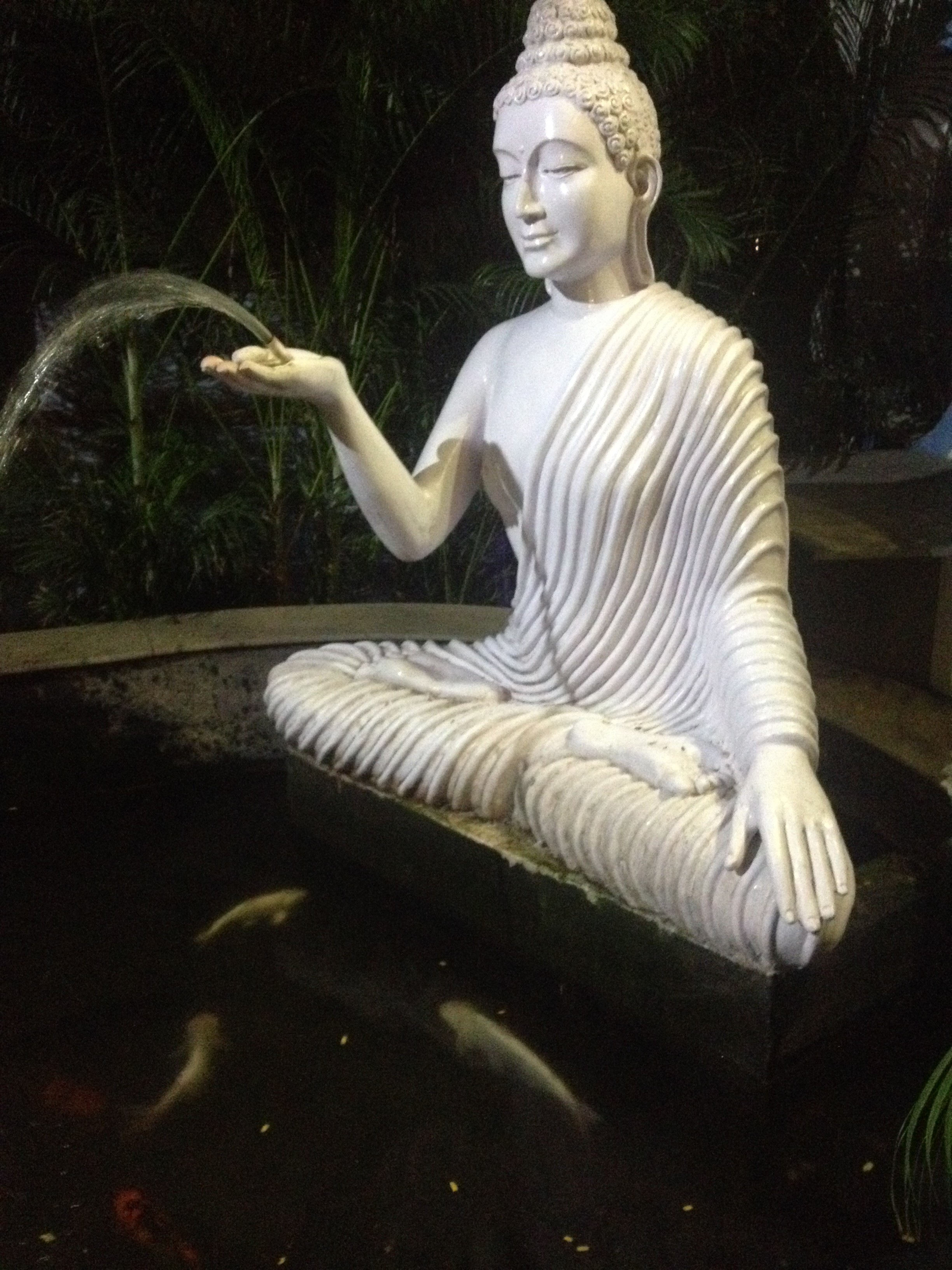 The zen starts outdoors. This Buddha statue welcomes visitors to Azzuri Bay